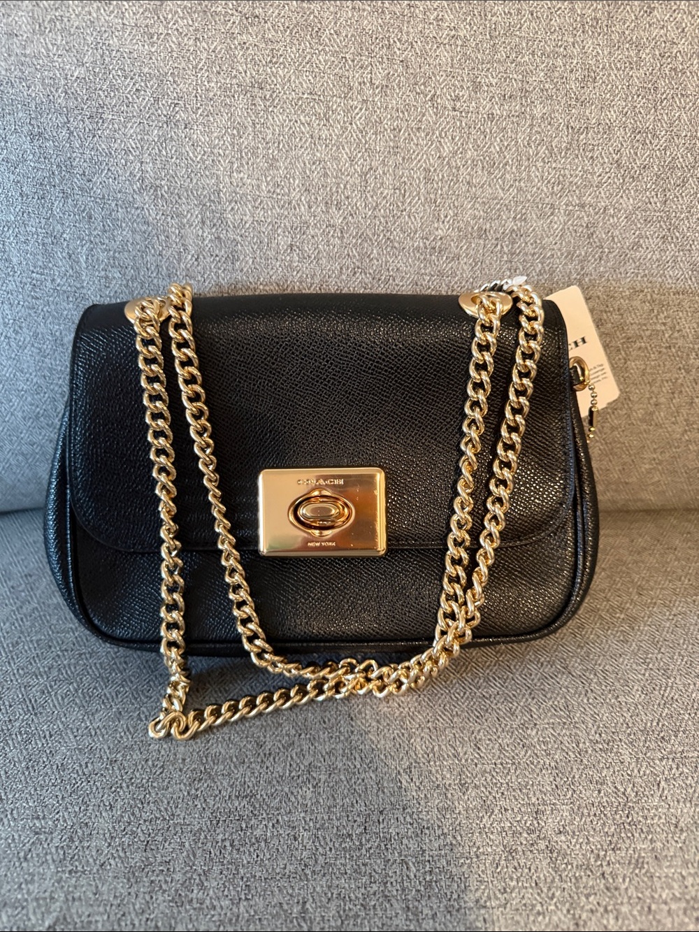 Coach Black Leather Shoulder Bag with Gold Turnlock and Chain